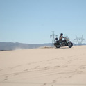  Please do not tell the rental company we did offroad riding on Harleys, strictly forbidden by policy. Yes, there are sand dunes on the road, hard to find them, though. Join our tour and you can DO THE SAME! Picture is taken in the Calico area, CA.