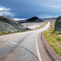 This piece of road is running across the Petrified Forest NP. A storm is approaching, what a pretty sign!
